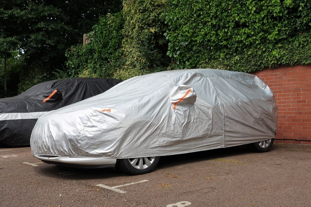 Vehicle Under Protective Cover In Parking Space